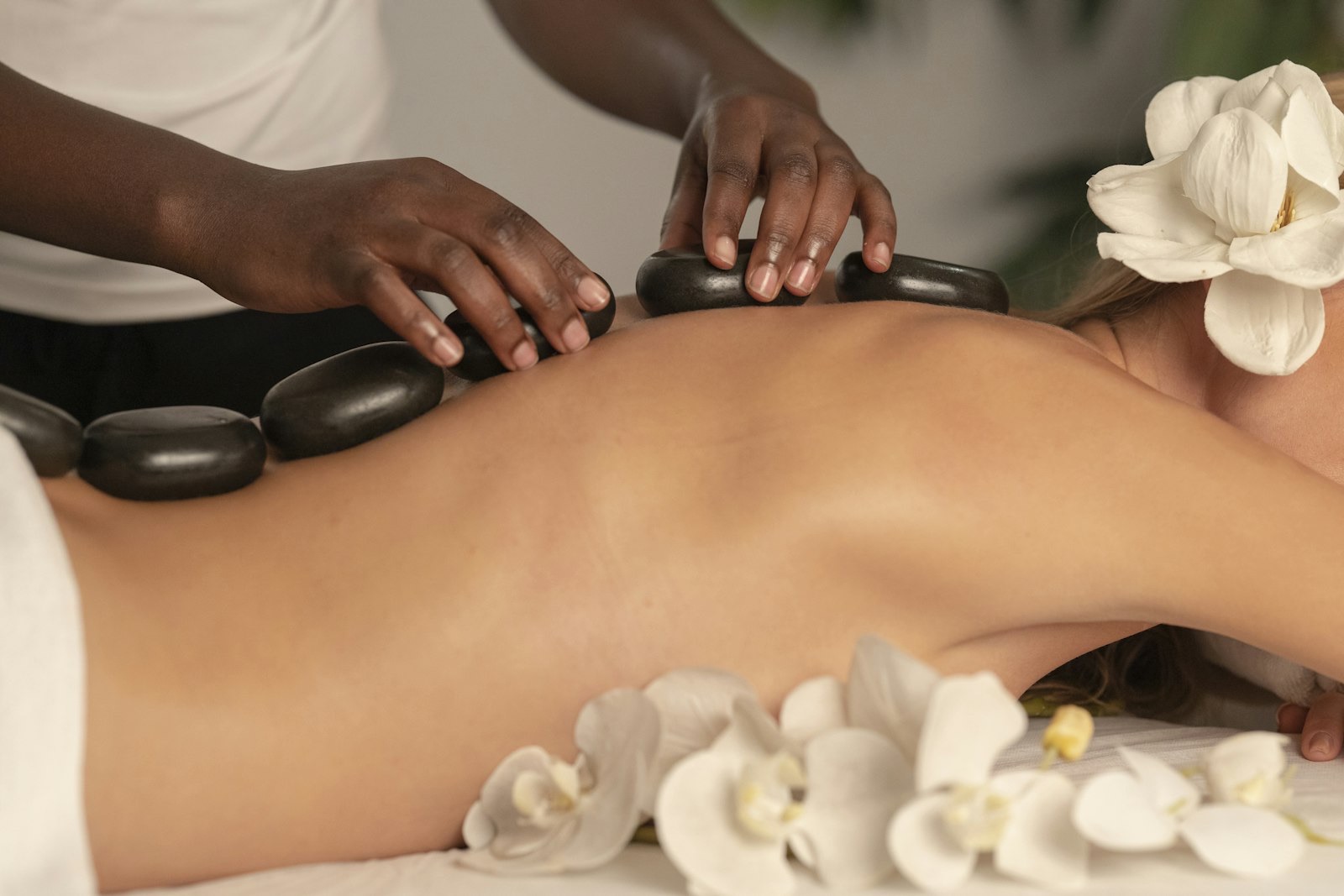 A hot stone treatment in progress
